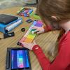Girl working with iPad and Specdrum rings with color map