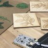Tactile pieces of lasercut leaves and leaves made from wikkisticks.