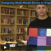 Teen participant displays his tactile book.