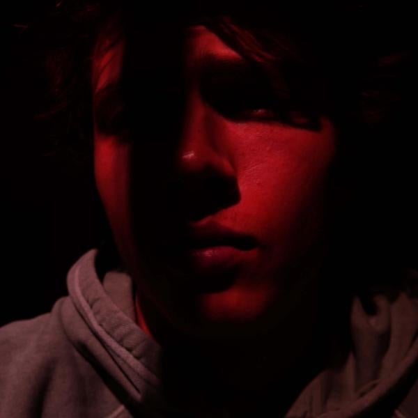 dark image of a mans face