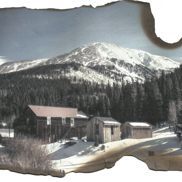 Mountain town with burned edges