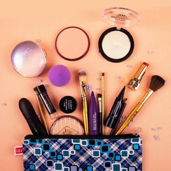 Makeup spilling out of a makeup case