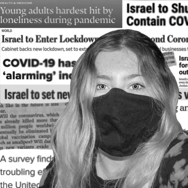 Artist wearing a mask in front of a collage of newspaper cut-outs