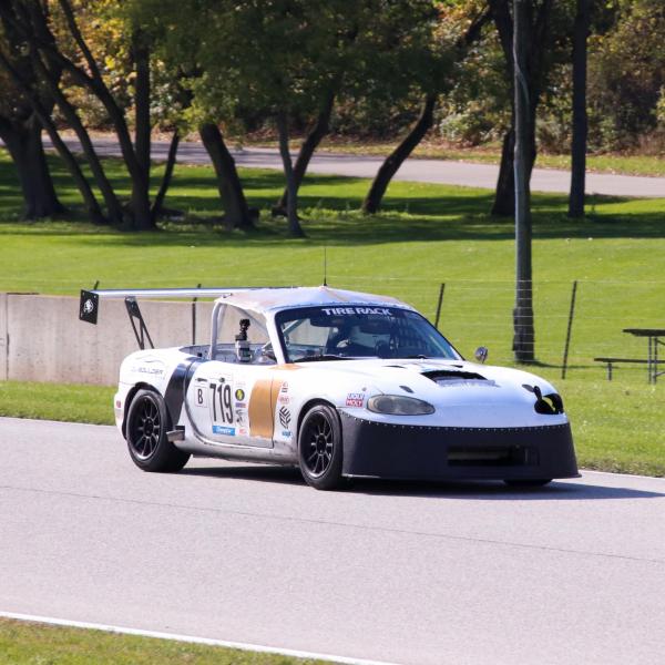 Racecar driving on a track