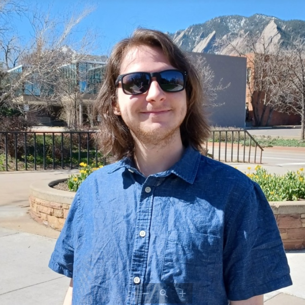 portrait of man with blue shirt