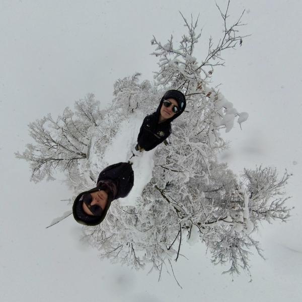 Mini-world view of artist and snowy landscape