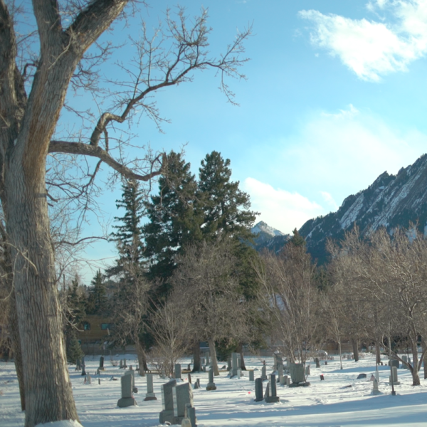 Cemetery in winter with the flat irons in the background