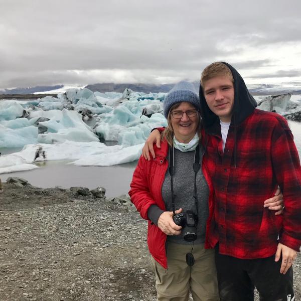 Two people by an icy shore