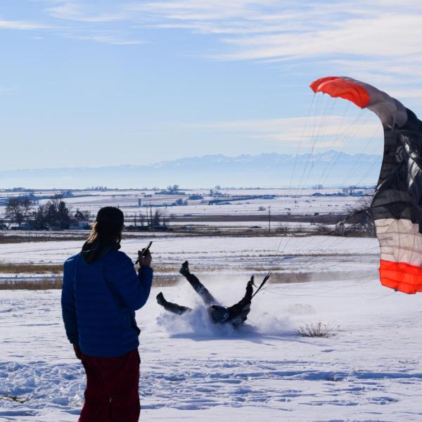 people playing in the snow
