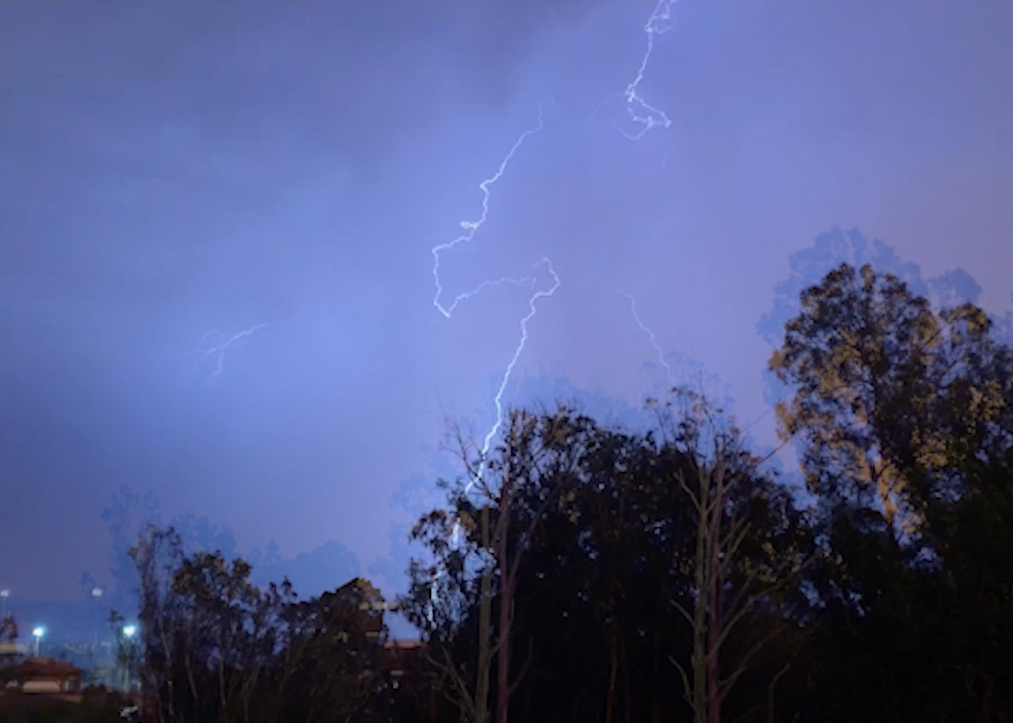 A lighting strike offset and layered with opacity lowered.