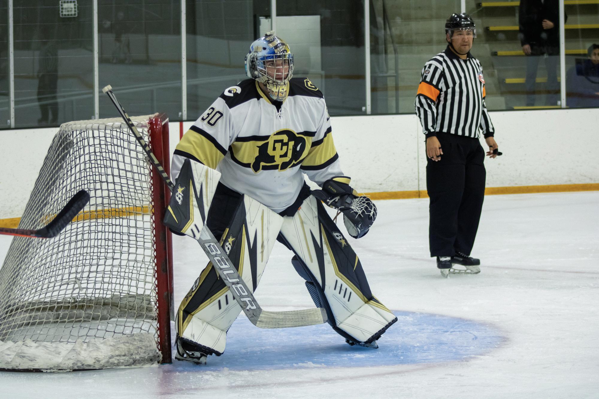 Freshmen goaltender Liam O'Gwen squares up for the shot against the Oklahoma Sooners on October 29, 2021. The Colorado Buffaloes would go onto win this hockey game at the CU Recreation Center after dropping three games on their road trip to Arizona. Coach Brent Tollar had a lot of praise for his freshmen goaltender.
