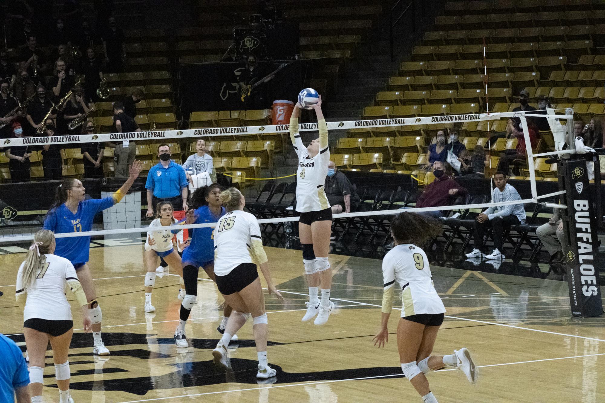 Senior Setter Jenna Ewert looking to set up teammate Alexia Keuhl for the spike on November 7, 2021. The Buffaloes would fall to the UCLA Bruins capping off an exciting Pac-12 matchup. Jenna Ewert stood out as the fierce leader of her squad playing every set and pumping upm her teammates. The Buffaloes would eventually fall short of a win but were playing strong moving towards the end of their 2021 season