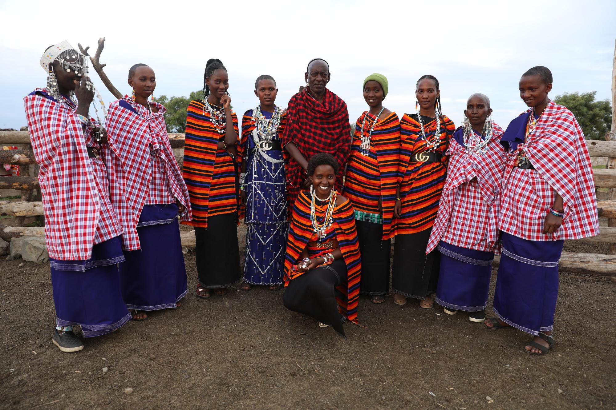 gathering of people in bright colored clothing
