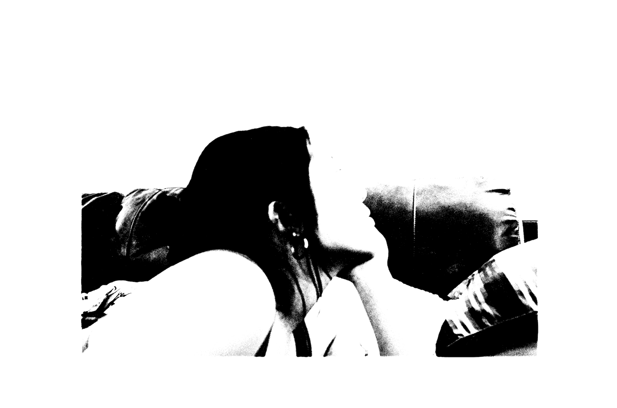 a black and white photo of a faceless female figure looking to the right