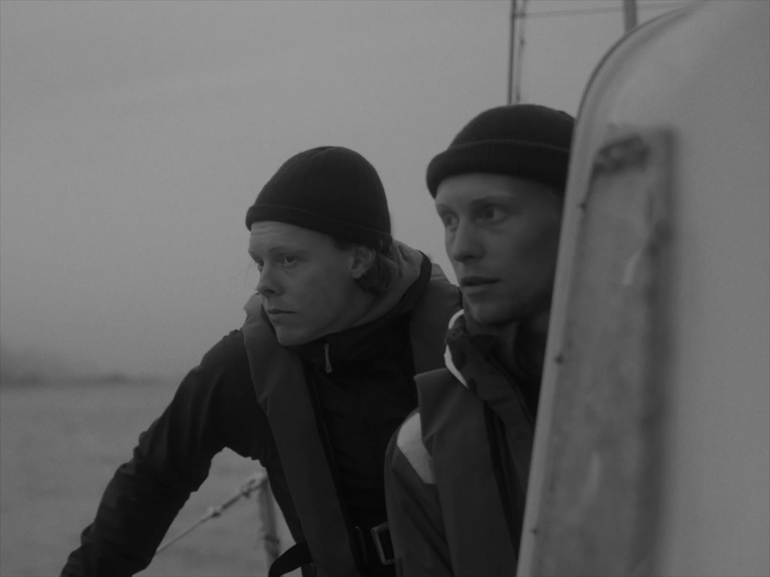 B&W two sailors on sailboat