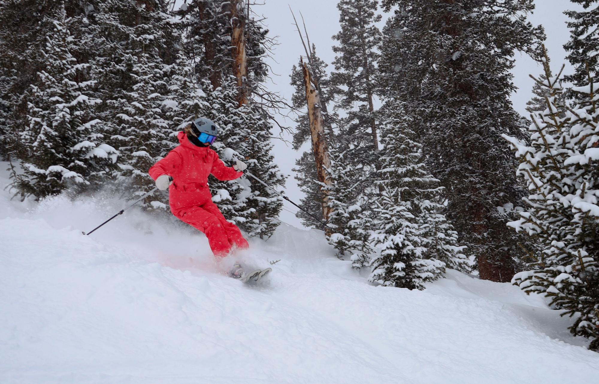 Jess skiing powder