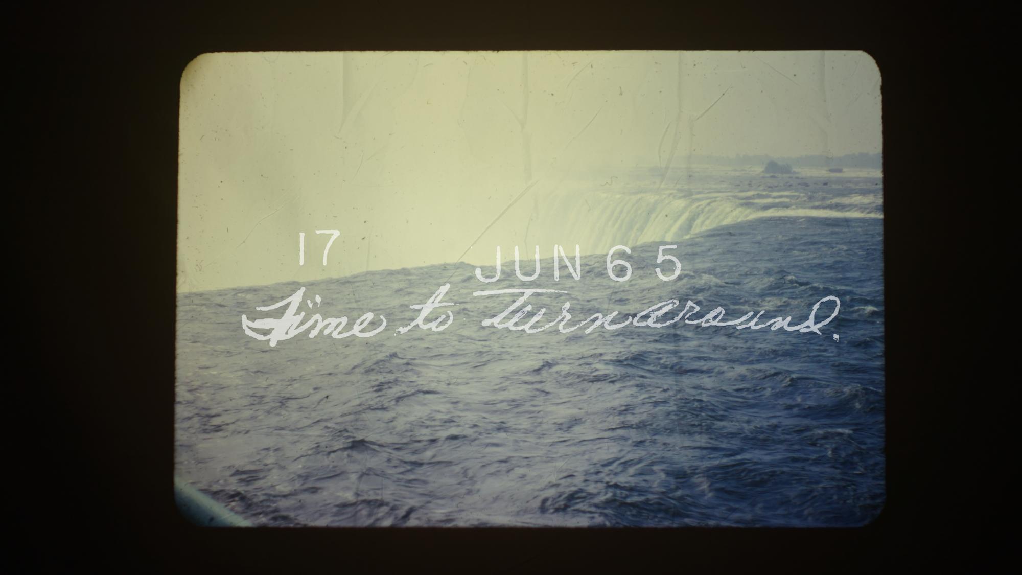 Projected slide of Niagara Falls with film slide overlay