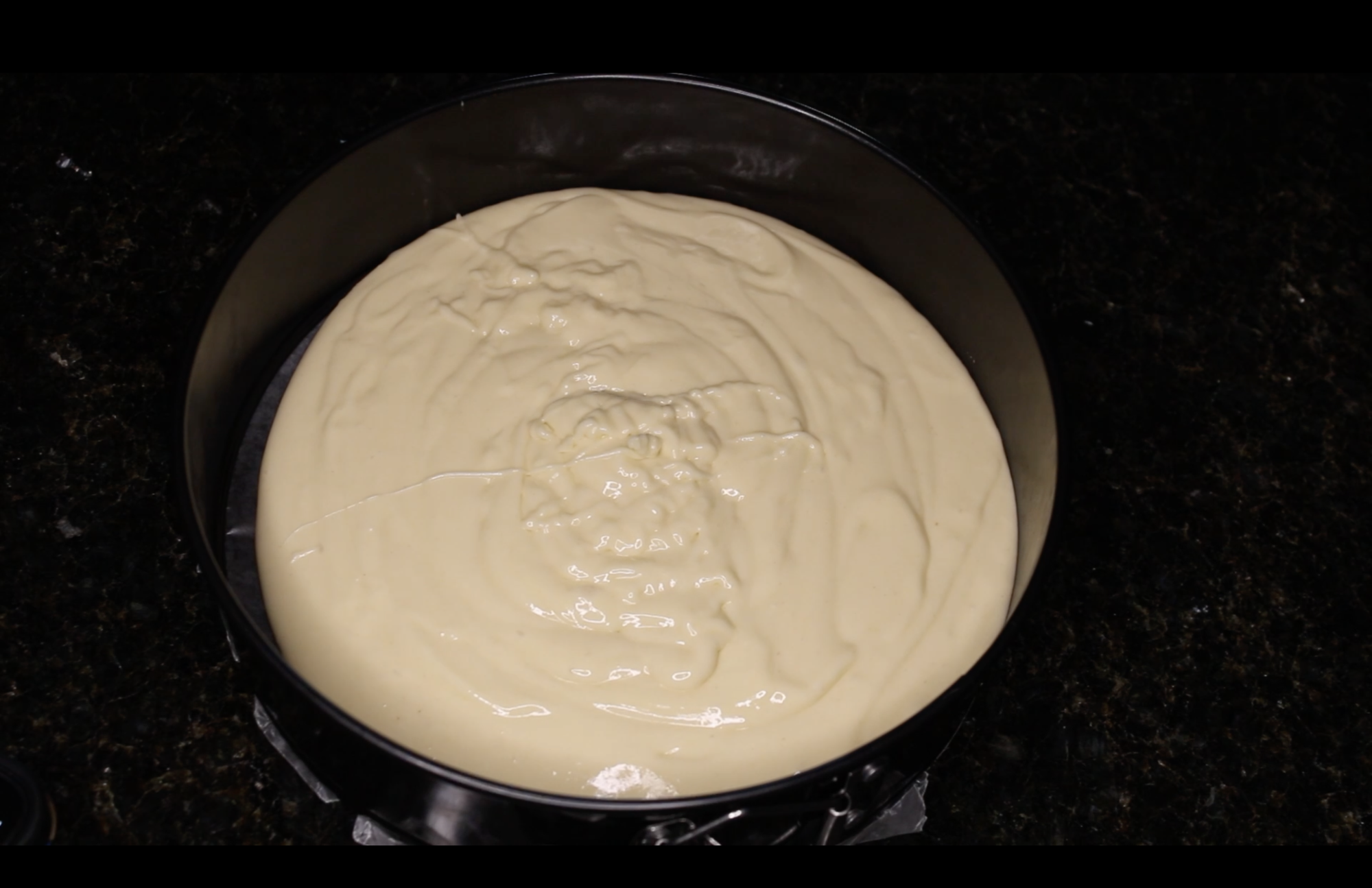 above shot of a cake pan filled with cake batter. BeccaNapier