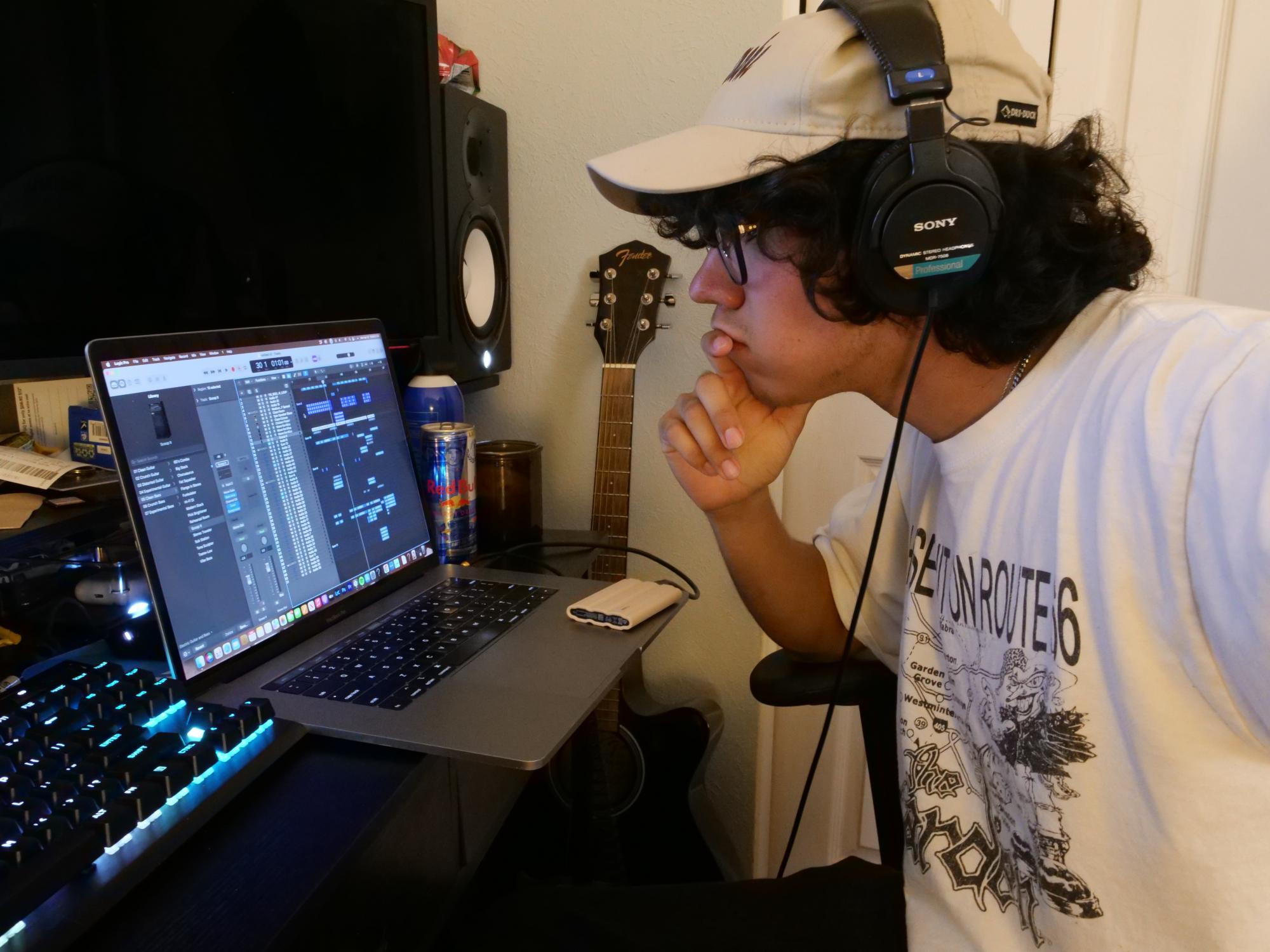 Esai is very locked in writing some music