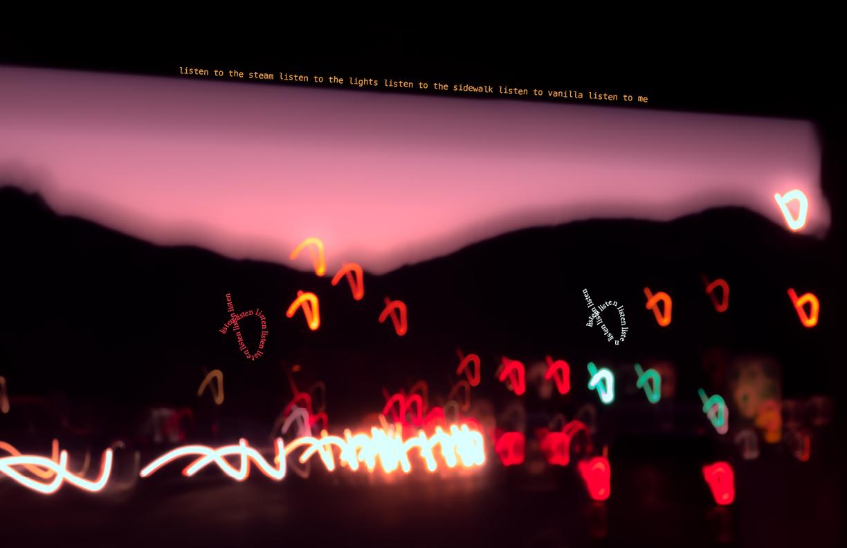 A silhouette of the Rocky Mountains shot from the passenger side of a car. Head and taillights of passing cars are swirled in a short loop-like pattern across the mountains. Above the pink hazy sky the text reads: “listen to the steam listen to the lights listen to the sidewalk listen to vanilla listen to me”.