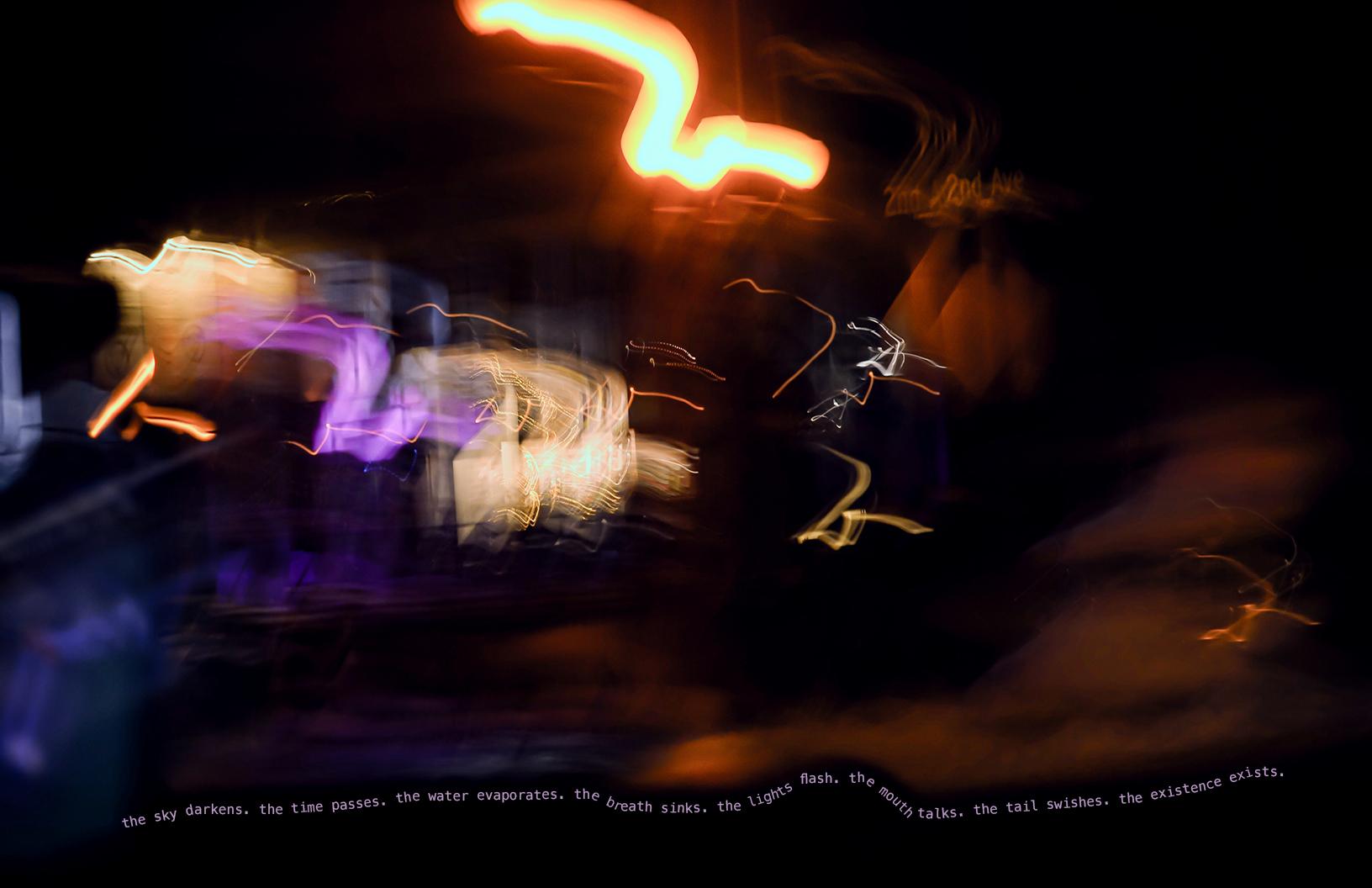 A diverse cluster of lapis, lilac, and warm tangerine squiggly neon lines blur against a black background. Underneath the haze, text follows the outline of the smog and reads “the sky darkens. the water evaporates. the breath sinks. the lights flash. the mouth talks. the tail swishes. the existence exists.”
