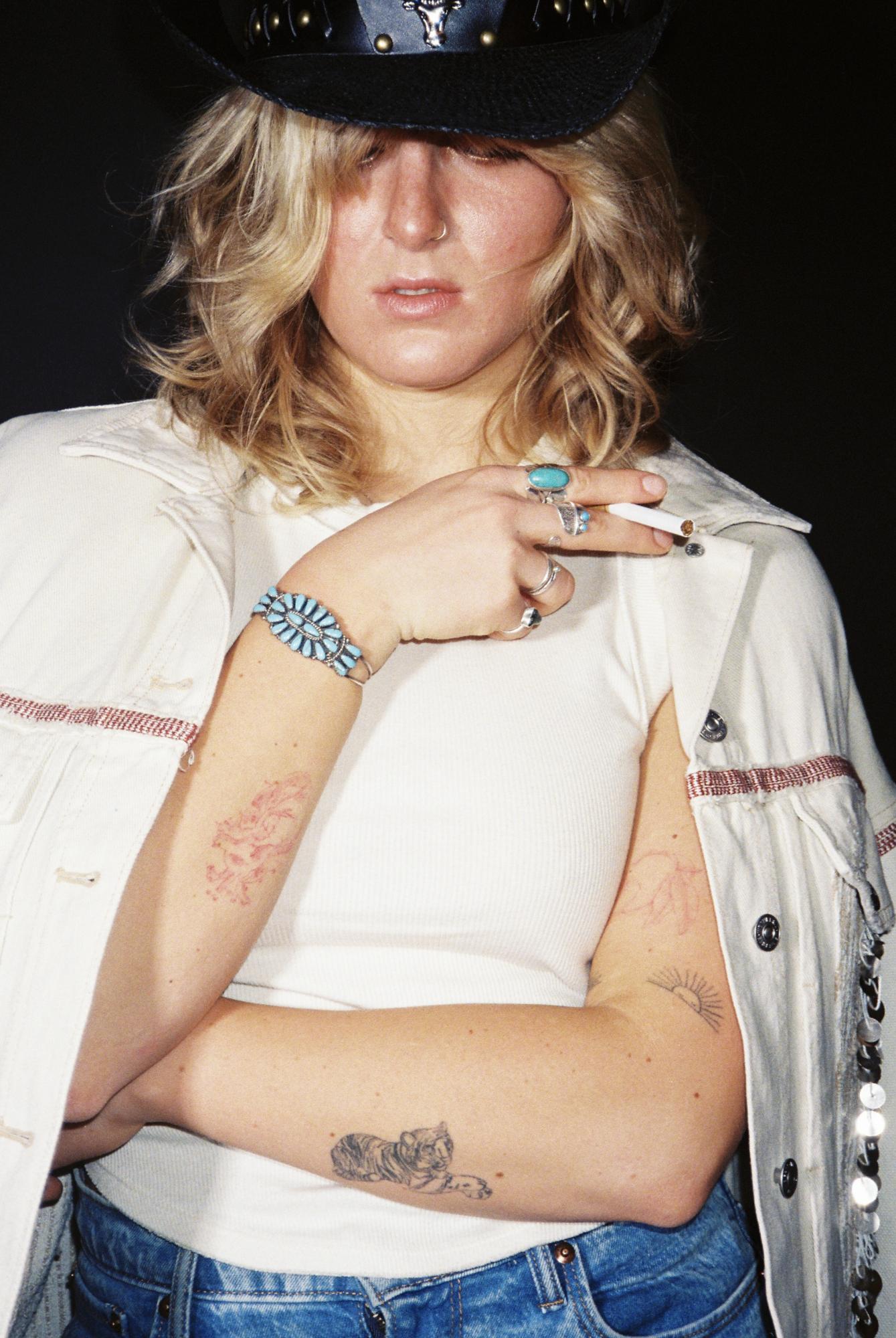 Cowgirl, modeled by Abby Boutrous, shot on 35mm film in studio lighting