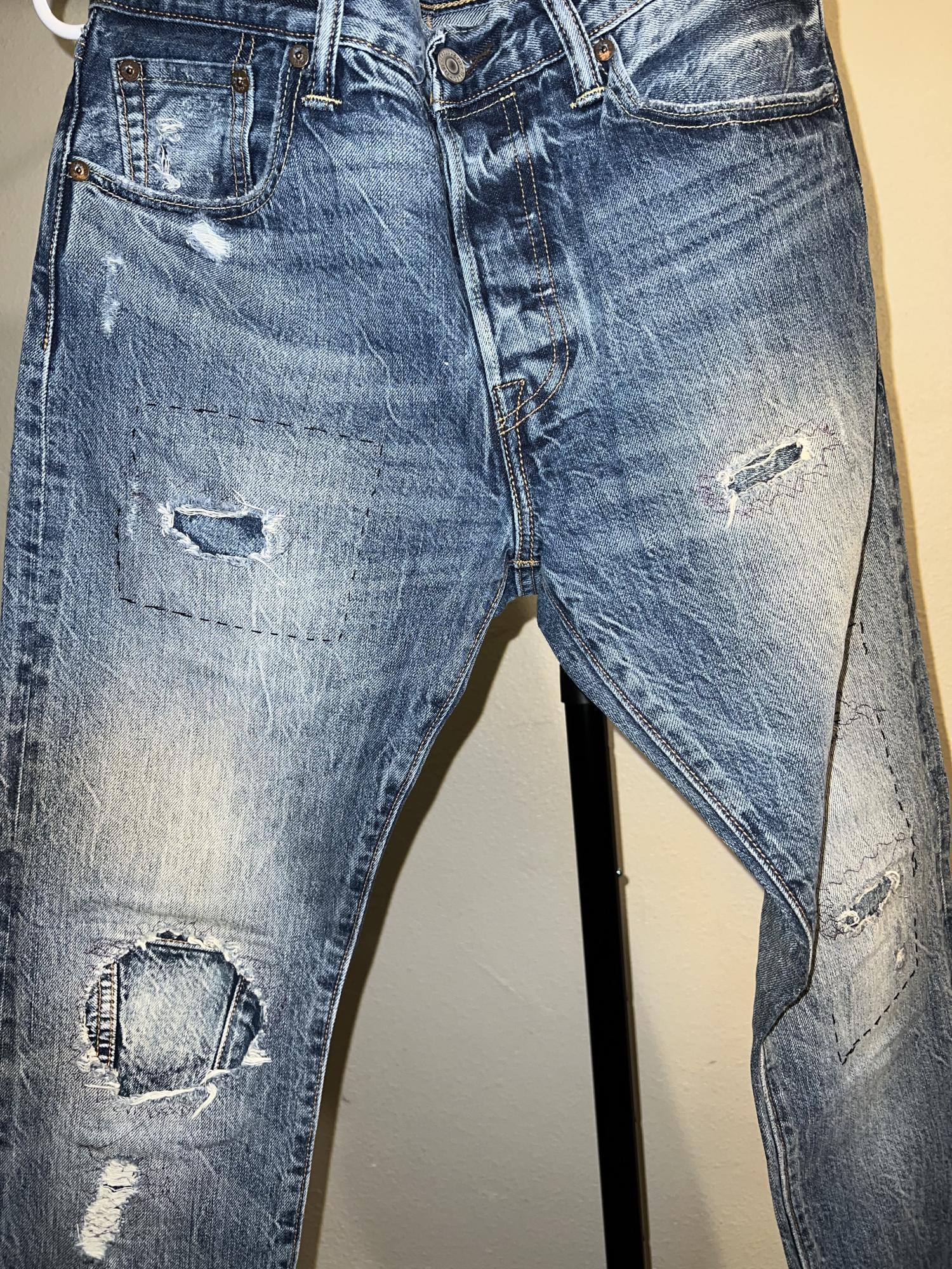 Denim jeans with rips