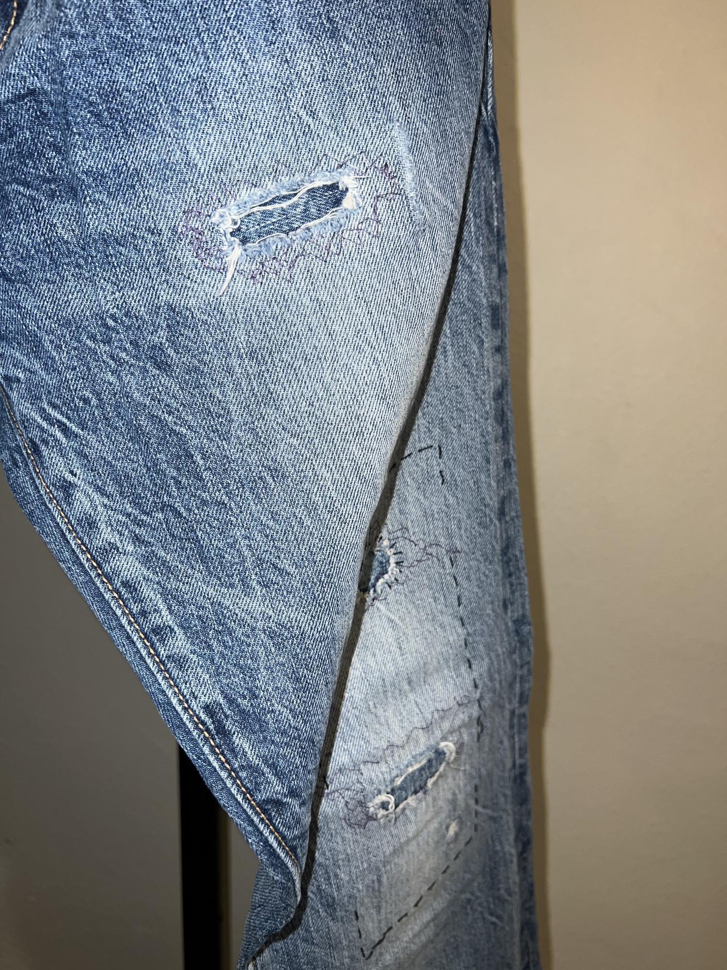 Denim jeans with rips