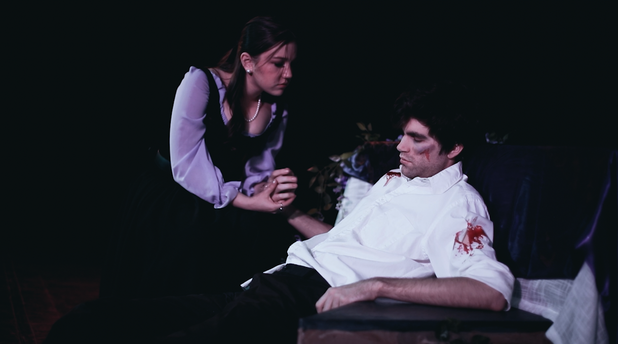 Image 1- Romeo and Juliet talk in a dark room