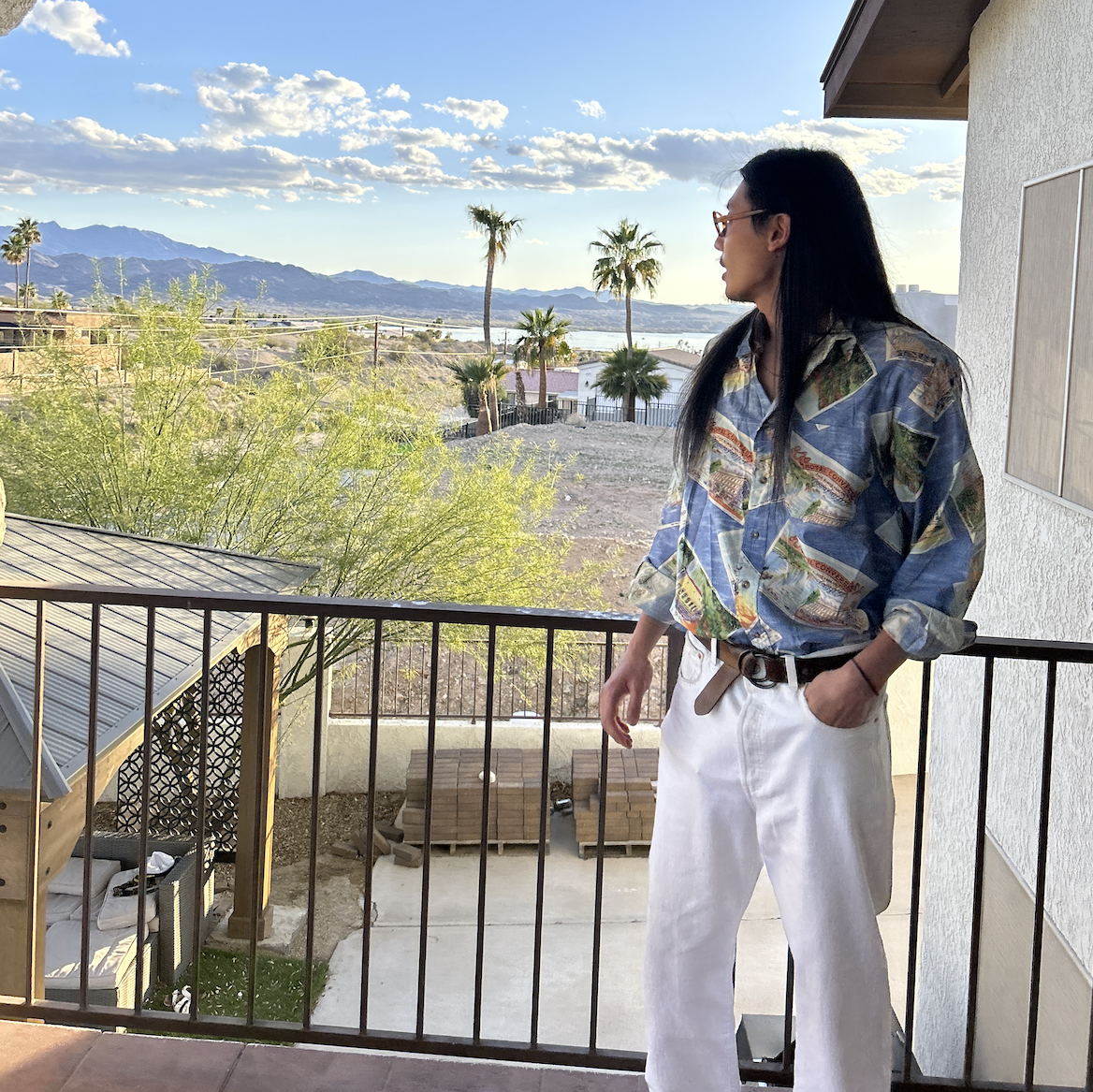 man standing on a balcony