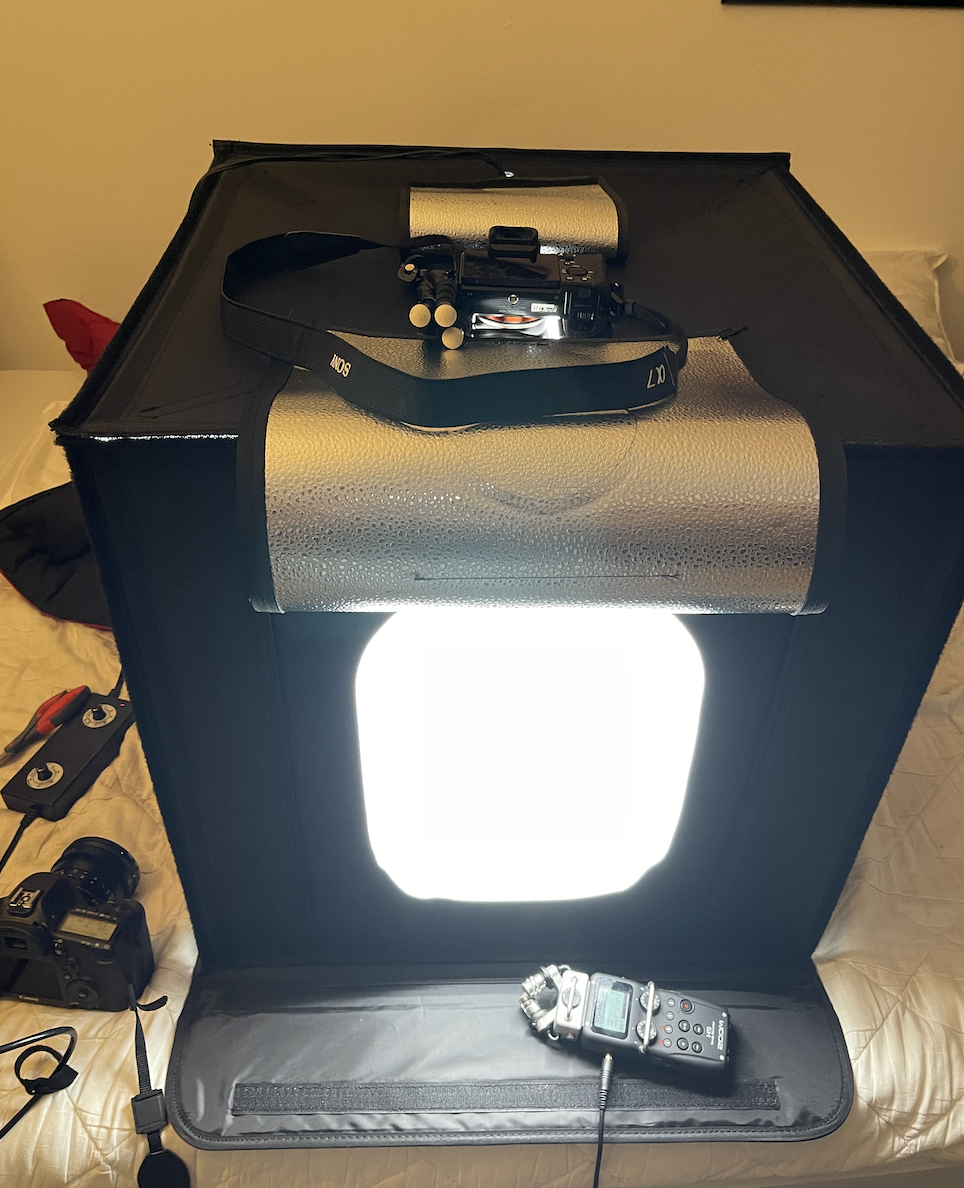 This is a lightbox setup and stage for all camera angles and props to be filmed in