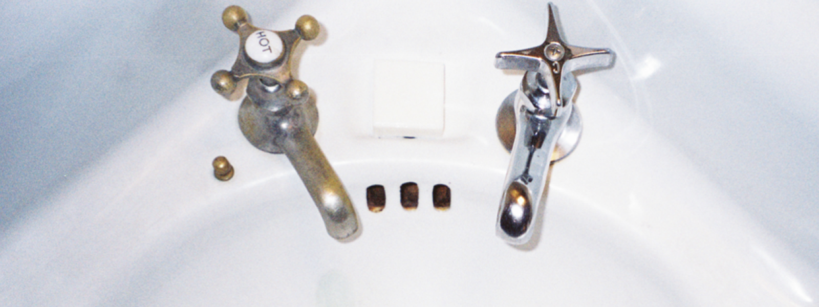 A sink with two taps