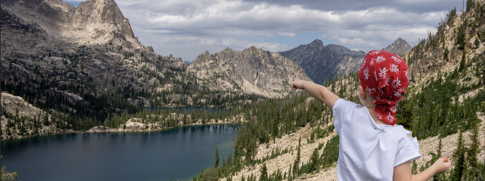 Boy looking out over mountains