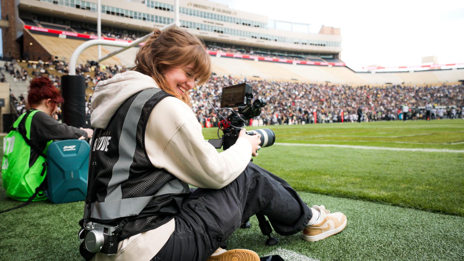 Cameraperson at a stadium