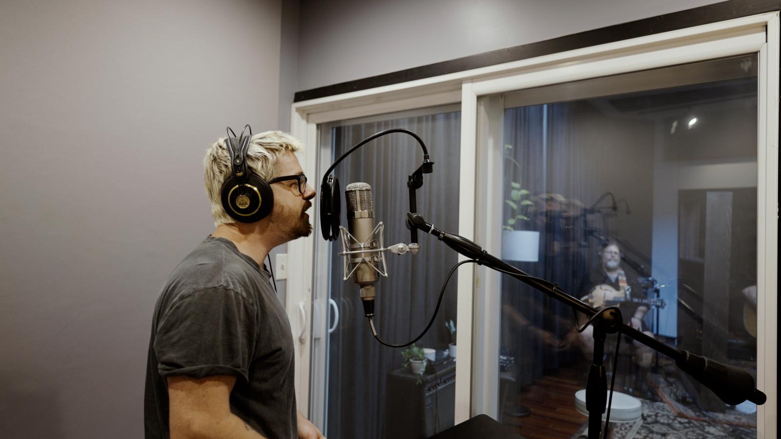 Josiah Leming of Josiah and the Bonnevilles recording vocals