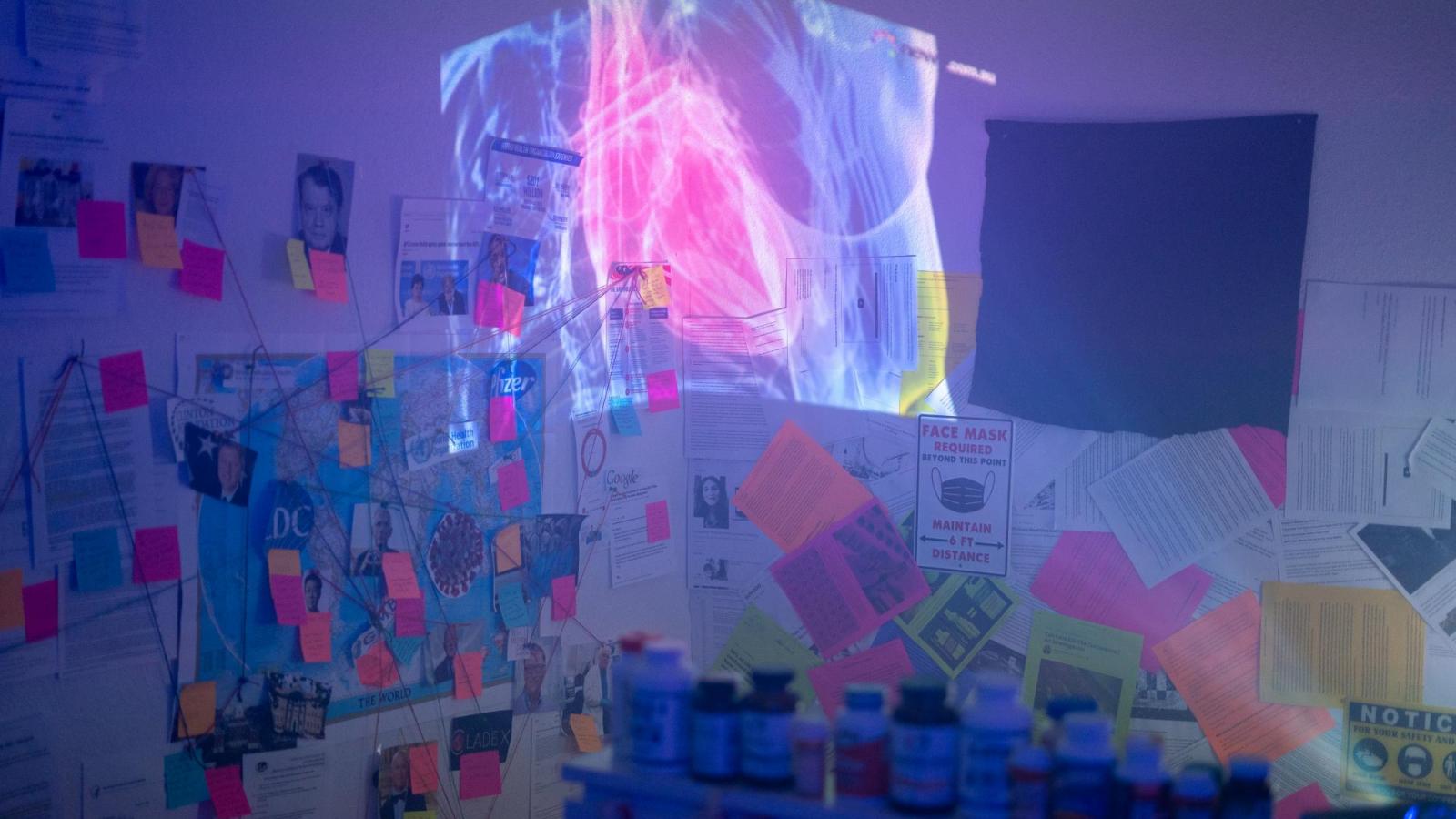 Installation room with neon lights and lasers