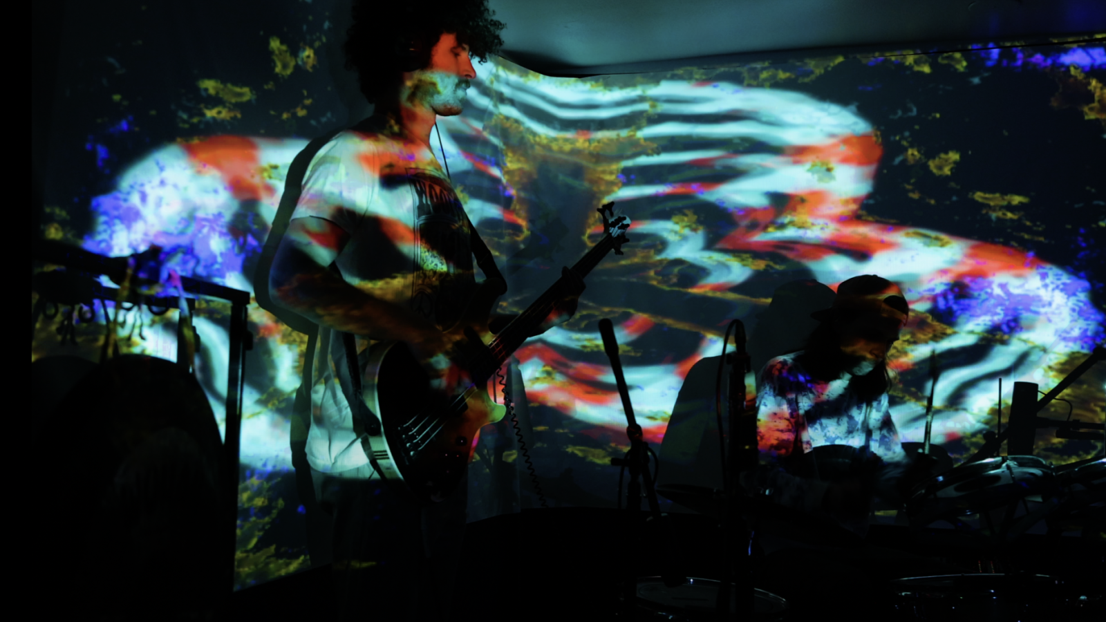 People playing music with video projections