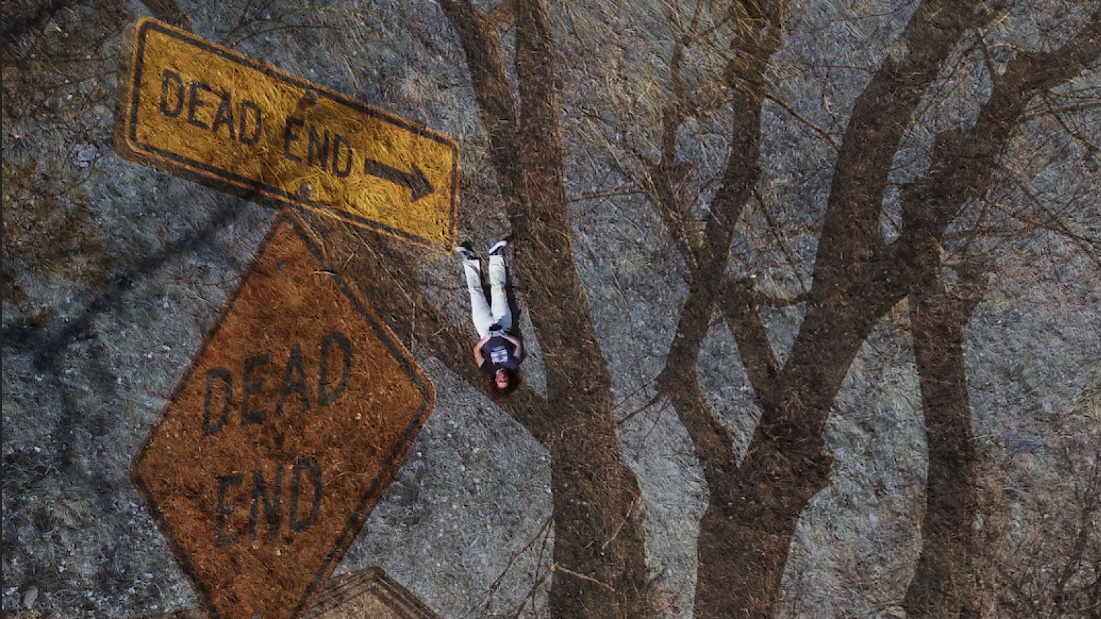 this is a still screenshot of my opening 'title' page to the project. It's an overlay of a dead end sign and me laying in dead grass.