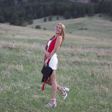 Claire Standing in a Field