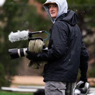 Owen Holding Camera