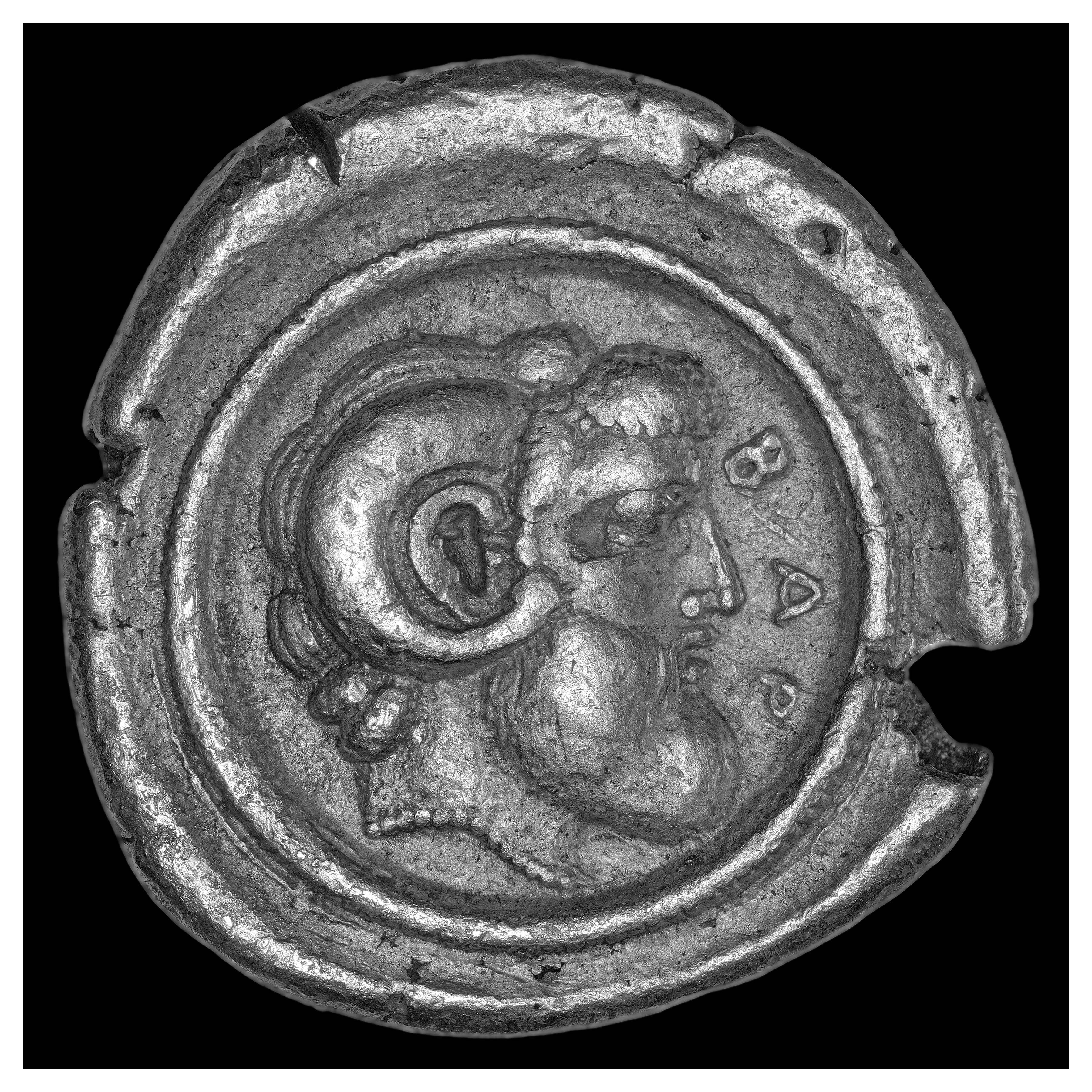 Reverse: Head of Zeus Ammon, facing to the right