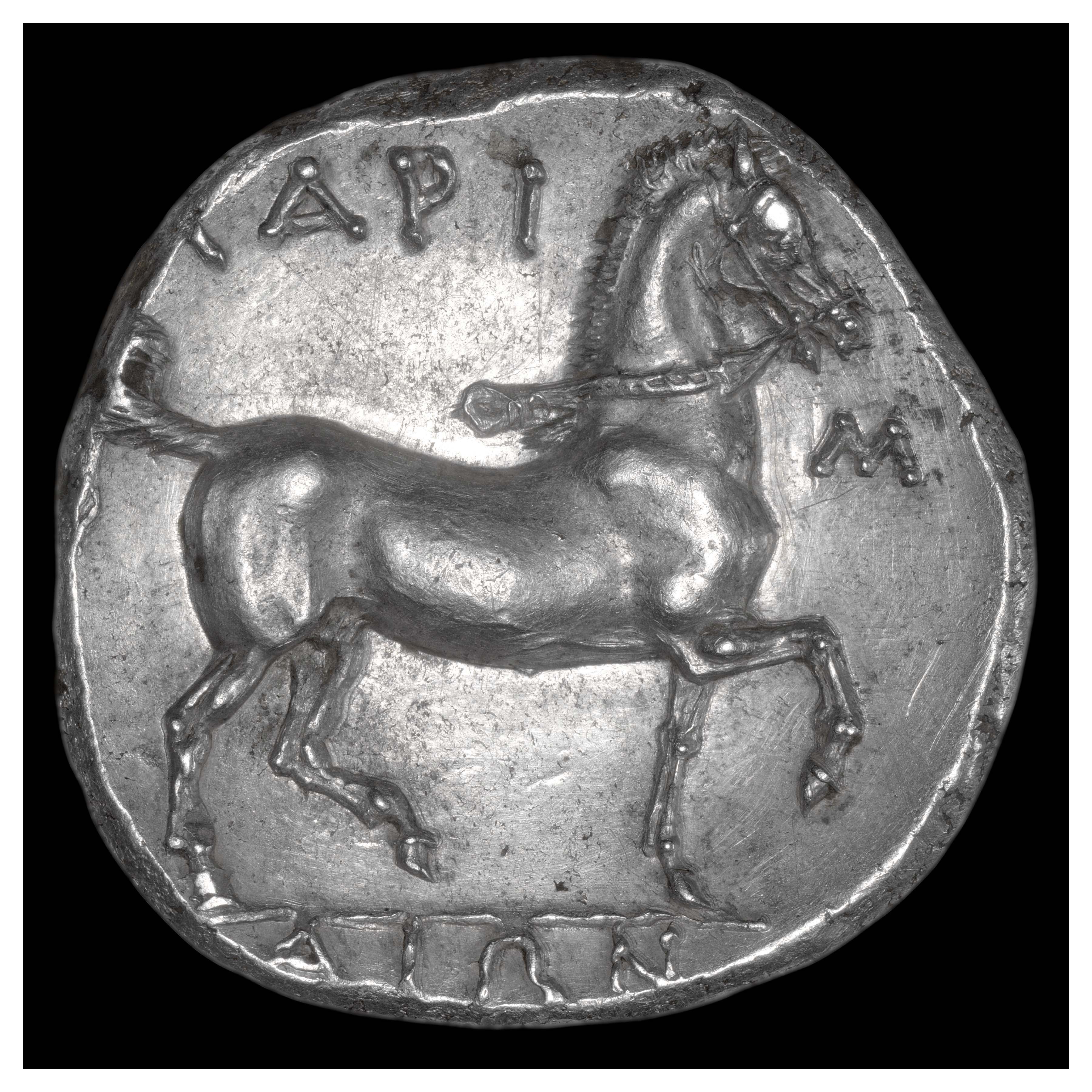 Silver Didrachm, Larissa, 350-340 BCE; Reverse: Prancing horse. Inscription ΛΑΡΙΣΑΙΩΝ (LARISAION = “of the Larissans”).