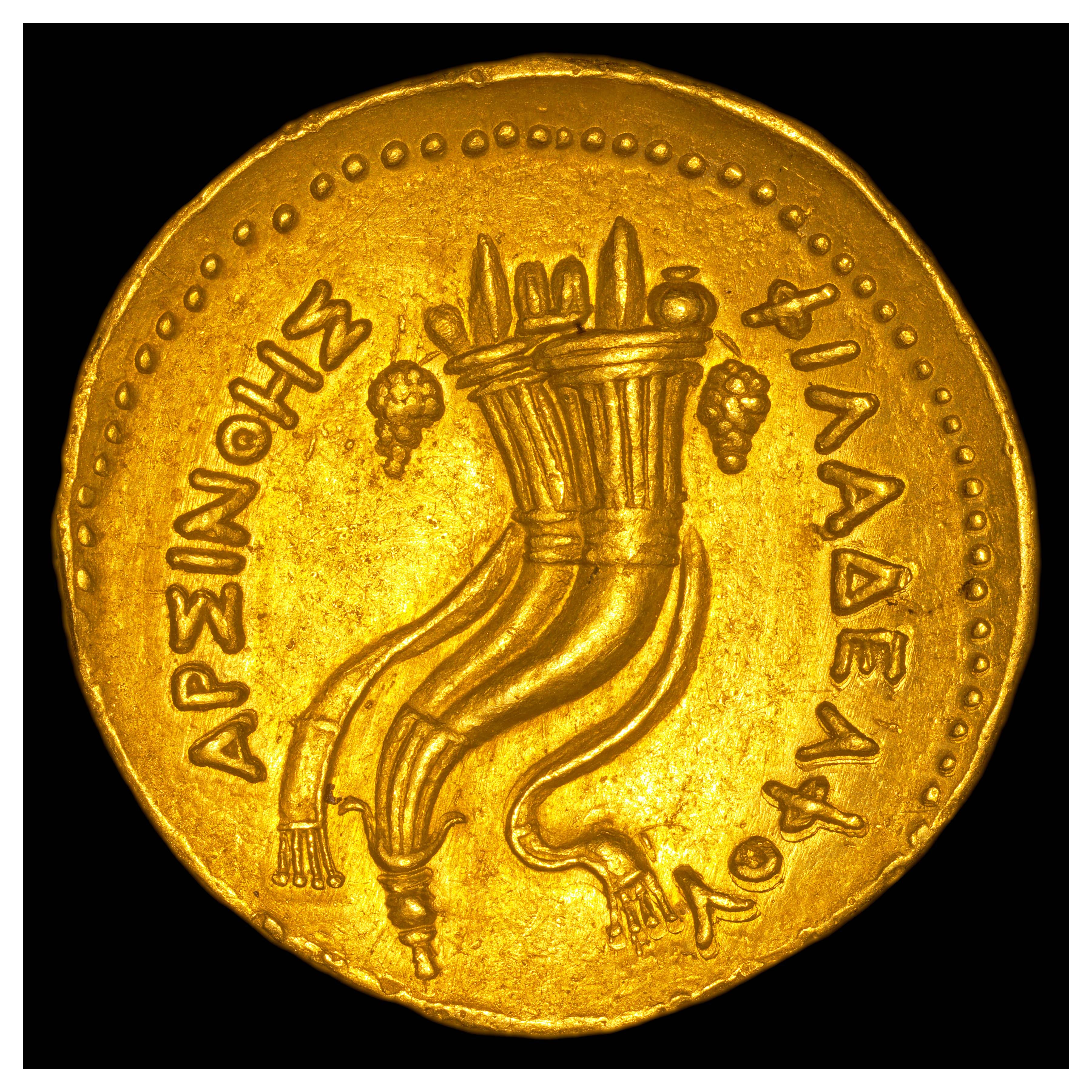 Gold Octadrachm, Alexandria, 253/2-246 BCE; Reverse: Double cornucopia. Inscription ΑΡΣΙΝΟΗΣ ΦΙΛΑΔΕΛΦΟΥ (“ARSINOES PHILADELPHOU” = “of Arsinoe Philadelphos”).