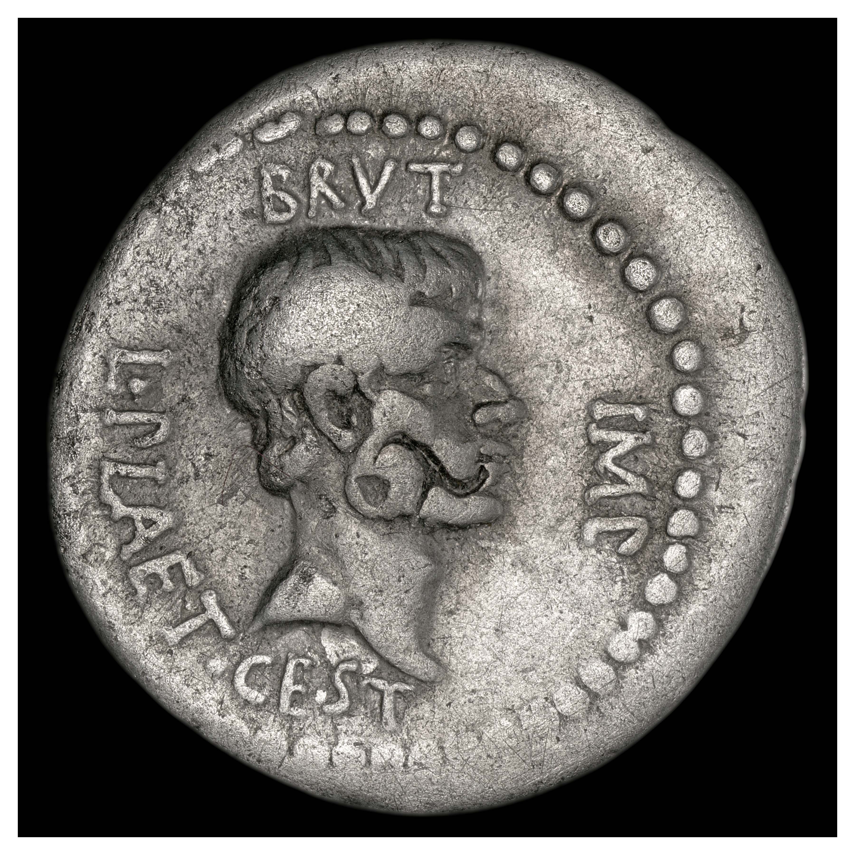 Obverse: Head of Brutus. Inscription BRVT IMP L PLAET CEST (= “Brutus imperator Lucius Plaetorius Cestianus”).