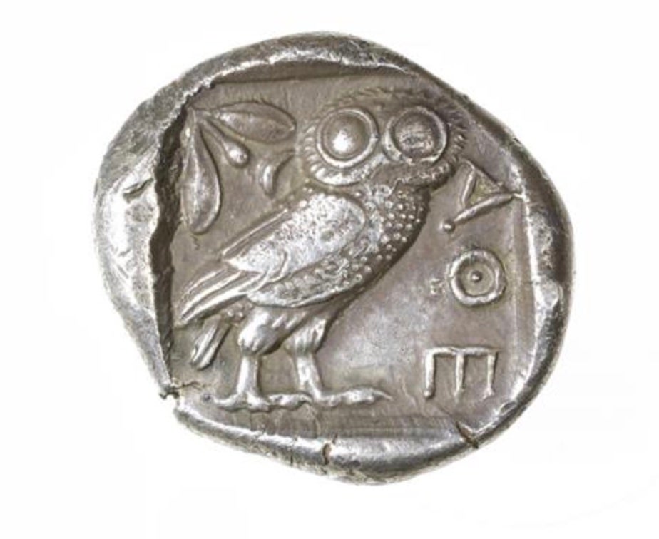 Silver Tetradrachm, Athens 454-404 BCE; Reverse: Owl with olive spray and small crescent. Inscription ΑΘΕ (“ATHE” = abbreviation for “of the Athenians”).