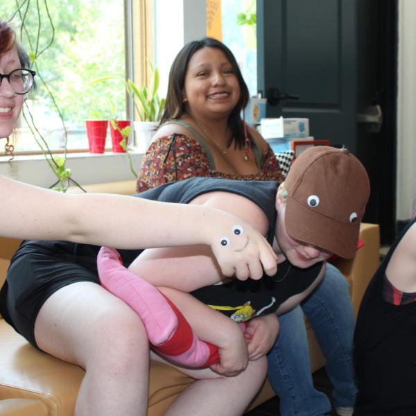 students with puppets