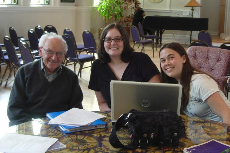 Jacques Pankove seated next to Stephanie Harper and Chelsea Bear