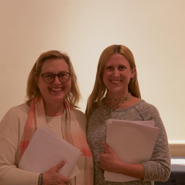 Staff members Ruth Seaholm and Rebecca Keisler gave a warm welcome and handed out programs