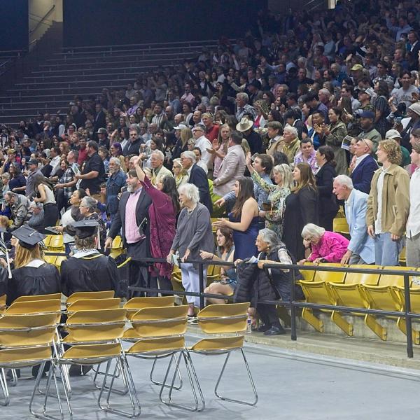 The graduates acknowledge the support of family and friends