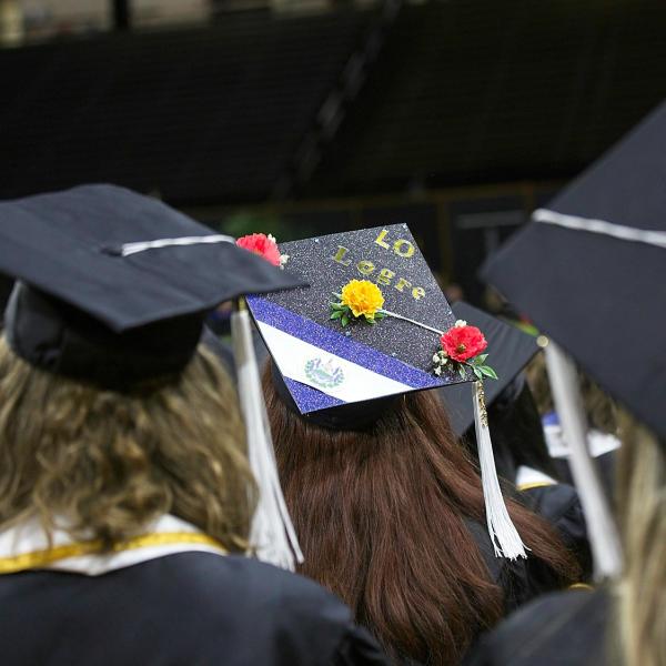 First mortarboard: Lo Logre. "I did it."